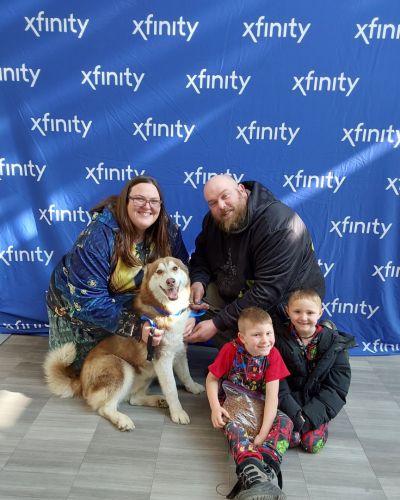 Large Dog Adoption Photo with Family